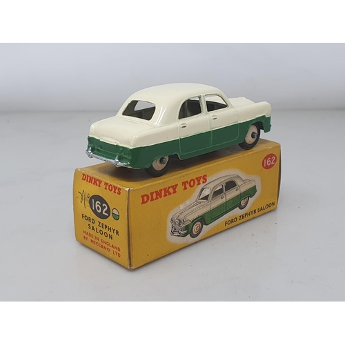 273 - A boxed Dinky Toys No.162 cream and green Ford Zephyr Saloon