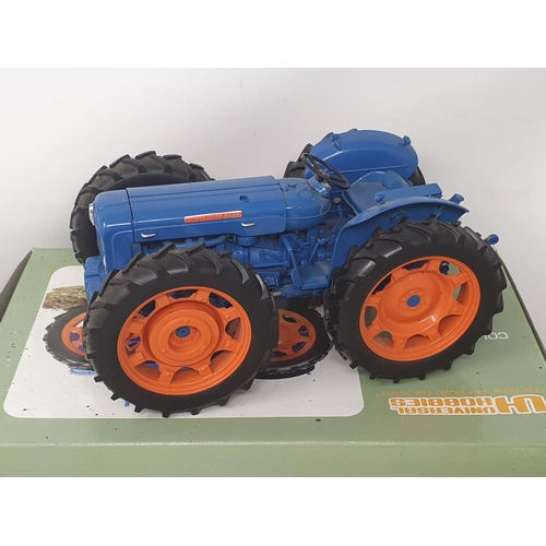 289 - A boxed Universal Hobbies County Super 4 Tractor