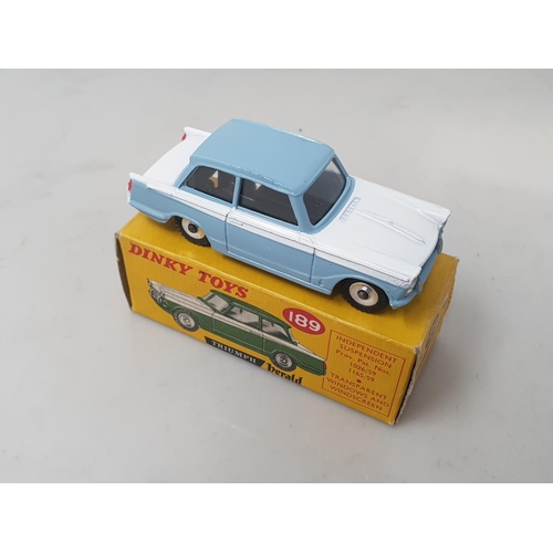 297 - A boxed Dinky Toys No.189 blue and white Triumph Herald