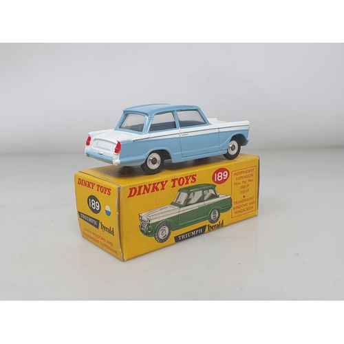 297 - A boxed Dinky Toys No.189 blue and white Triumph Herald