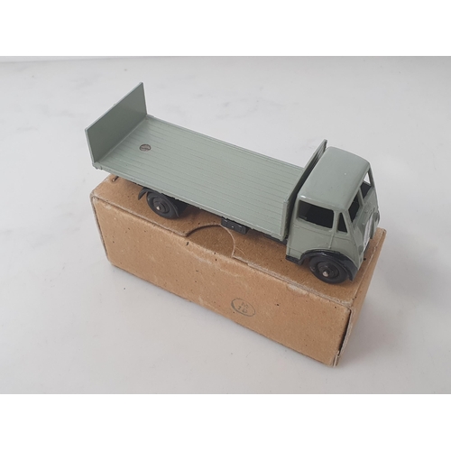 300 - A boxed Dinky Toys No.513 grey and black Guy Flat Truck