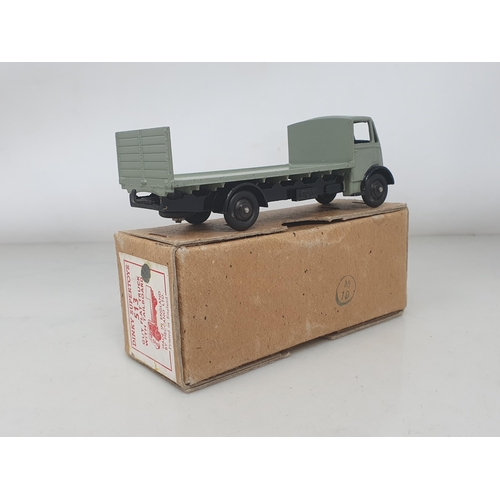 300 - A boxed Dinky Toys No.513 grey and black Guy Flat Truck