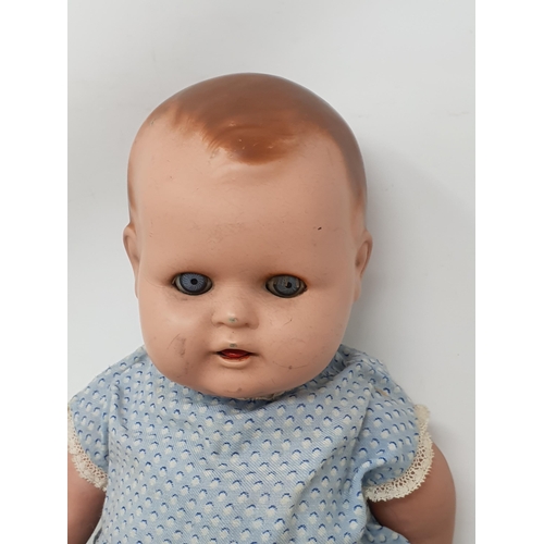 305 - A 1950's Doll, an Armand Marseille 390 Doll's Head with sleepy eyes 2 1/2in D and an Armand Marseill... 