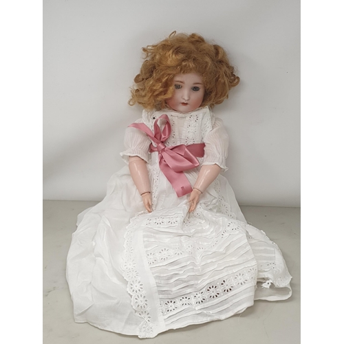 321 - A German made bisque Doll 26in