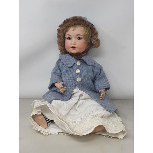 324 - An Armand Marseille DRGM 97 bisque headed Doll with sleeping eyes (fingers chipped) 18in