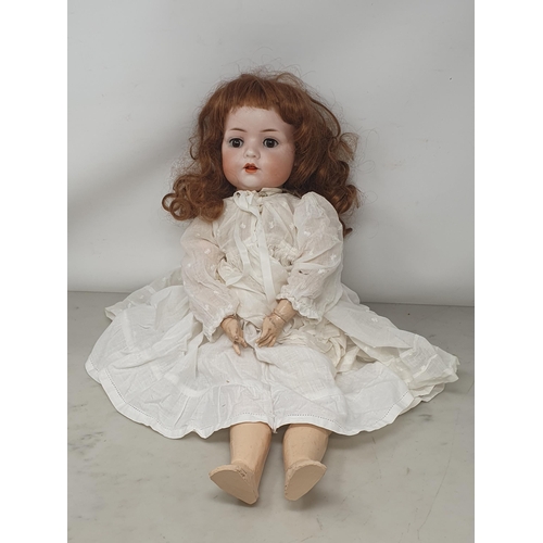 325 - A Bahr & Proschild bisque headed Doll stamped 678 with sleeping eyes 20in