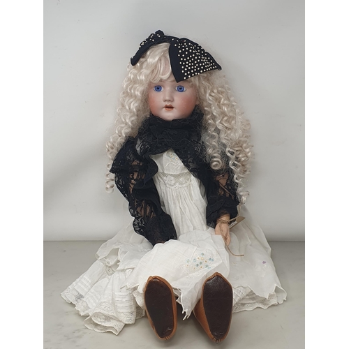 338 - A Heinrich Handwerck, Simon & Halbig bisque headed Doll with fixed blue eyes, 24in