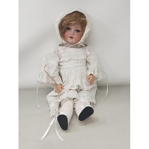 343 - A Bergmann Walterhausen bisque headed Doll with sleeping eyes marked 1916, 19in