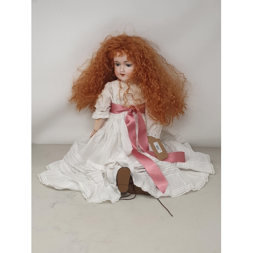 353 - An Armand Marseille 390 bisque headed Doll with sleeping blue eyes, 23in