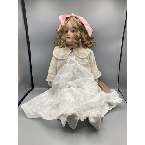 356 - A Queen Louise bisque headed Doll  with sleeping brown eyes, 26in