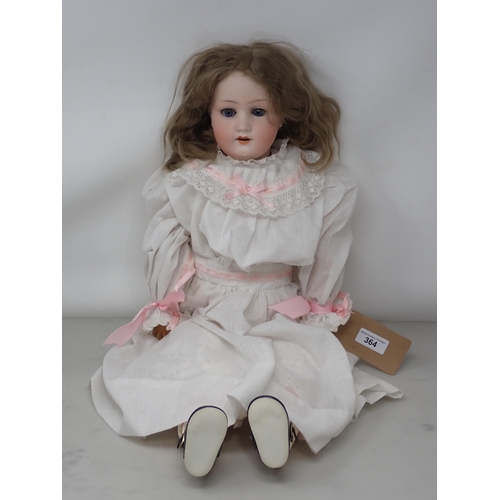 364 - A Heubach Koppelsdorf bsique headed Doll with fixed blue eyes stamped 250.3 to head