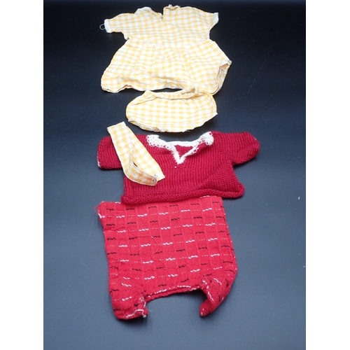 370 - A quantity of antique Doll's Clothes including lace and knitted woollen garments