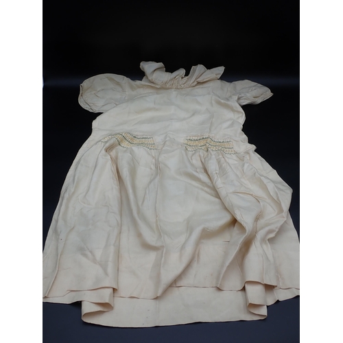 370 - A quantity of antique Doll's Clothes including lace and knitted woollen garments