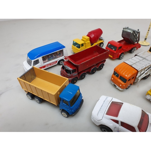 379 - Fifteen Husky and Matchbox Vehicles and a diecast Esso Sign