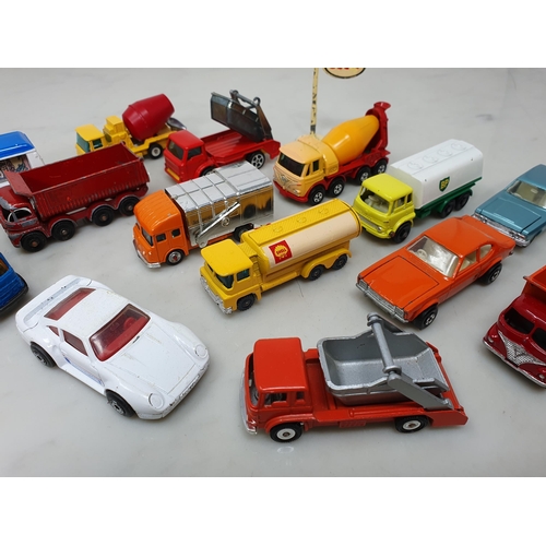 379 - Fifteen Husky and Matchbox Vehicles and a diecast Esso Sign