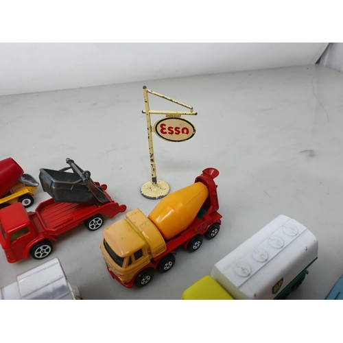 379 - Fifteen Husky and Matchbox Vehicles and a diecast Esso Sign