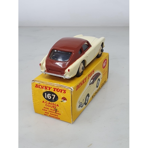 384 - A boxed Dinky Toys No.167 brown and cream A.C. Aceca Coupe