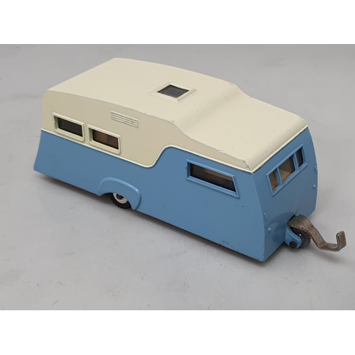 385 - A boxed Dinky Toys No.188 blue and cream Caravan and a boxed 190 yellow Caravan