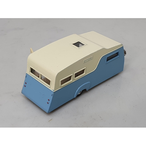 385 - A boxed Dinky Toys No.188 blue and cream Caravan and a boxed 190 yellow Caravan