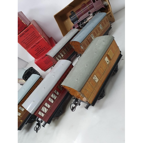 410 - A Hornby 0 gauge clockwork No.501 Locomotive and boxed Tender, a boxed No.1 Passenger Coach, boxed N... 