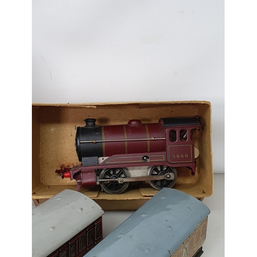 410 - A Hornby 0 gauge clockwork No.501 Locomotive and boxed Tender, a boxed No.1 Passenger Coach, boxed N... 