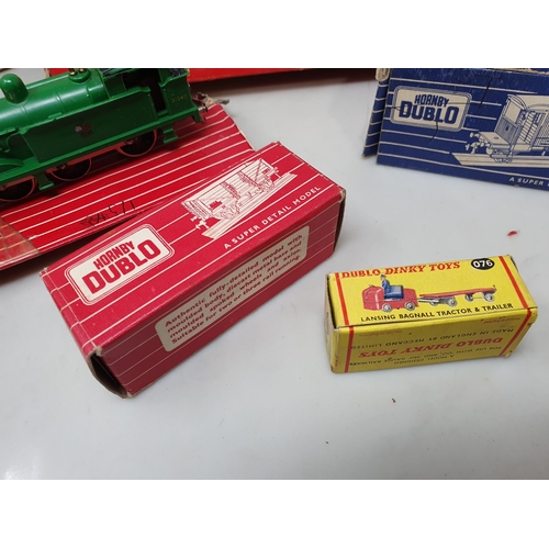 413 - A box of Hornby Dublo and Triang including 2207 0-6-0T (A/F), boxed 4620 Breakdown Crane, two Marsha... 