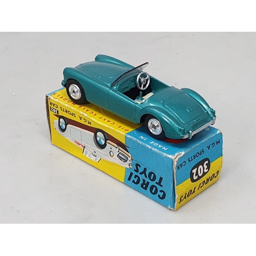 421 - A boxed Corgi Toys No.302 metallic green MGA Sports Car