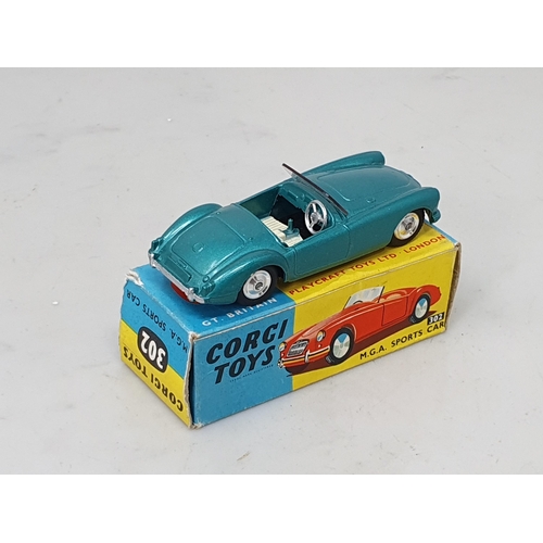 421 - A boxed Corgi Toys No.302 metallic green MGA Sports Car