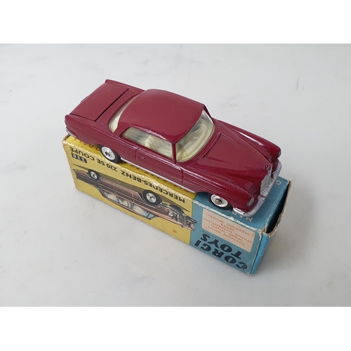 438 - A boxed Corgi Toys No.230 maroon Mercedes-Benz 220SE Coupe