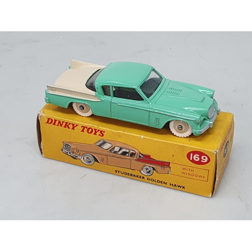 445 - A boxed Dinky Toys No.169 cream and green Studebaker Golden Hawk