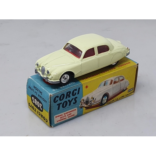 464 - A boxed Corgi Toys No.208S Jaguar 2.4L with dished hubs