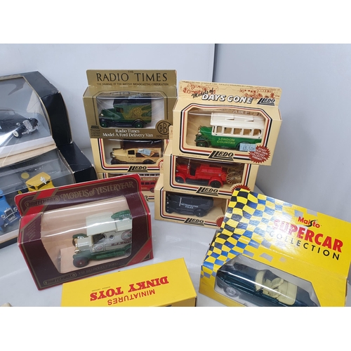 474 - A box of boxed and unboxed modern diecast Models including Solido, Corgi and Lledo