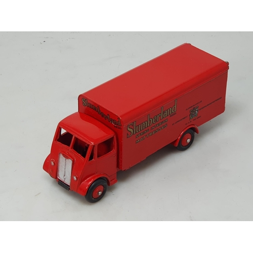 486 - A boxed Dinky Toys No.514 Guy Slumberland Van