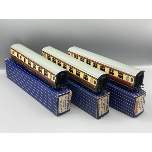 50 - Seven Hornby Dublo 3-rail Coaches comprising pair of D13, D14 Brake with over sticker box, pair D12,... 