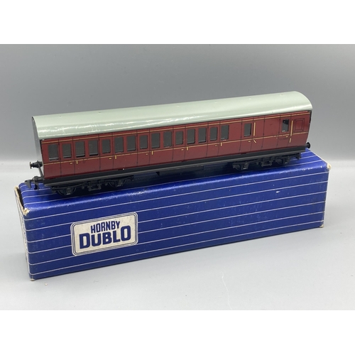 50 - Seven Hornby Dublo 3-rail Coaches comprising pair of D13, D14 Brake with over sticker box, pair D12,... 