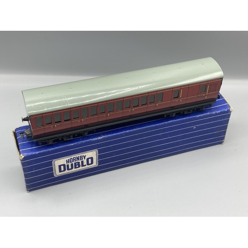 50 - Seven Hornby Dublo 3-rail Coaches comprising pair of D13, D14 Brake with over sticker box, pair D12,... 