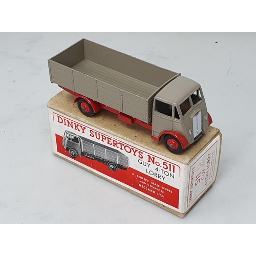 501 - A boxed Dinky Toys No.511 Guy 4-ton Lorry with fawn cab and back and red chassis