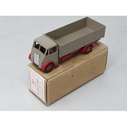 501 - A boxed Dinky Toys No.511 Guy 4-ton Lorry with fawn cab and back and red chassis