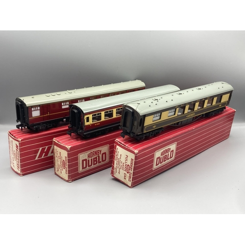 56 - Six Hornby Dublo 2-rail Coaches comprising 4081 B.R. Restaurant Car (some corrosion at ends and a bl... 