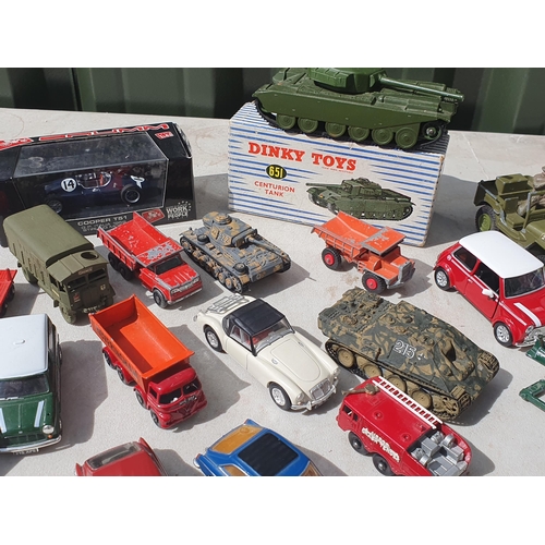 560 - A boxed Dinky Toys No.651 Centurion Tank, an unboxed Dinky Toys Jeep, two Dinky Toys MGB-GTs, other ... 