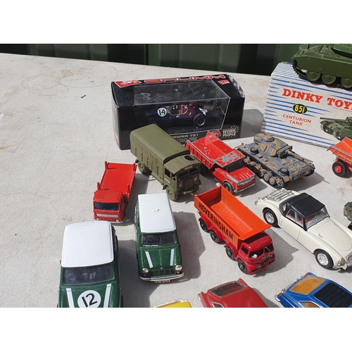 560 - A boxed Dinky Toys No.651 Centurion Tank, an unboxed Dinky Toys Jeep, two Dinky Toys MGB-GTs, other ... 