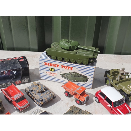 560 - A boxed Dinky Toys No.651 Centurion Tank, an unboxed Dinky Toys Jeep, two Dinky Toys MGB-GTs, other ... 