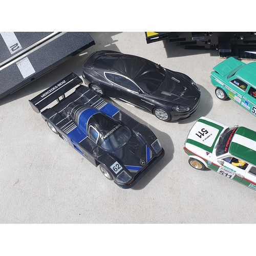 562 - Eight unboxed Scalextric and Revell Slot Cars including Porsche and Mercedes Le Mans, Audi TT, BMW S... 