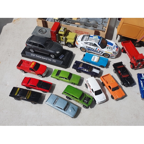 566 - A box of spares and repairs diecast Models, a boxed Corgi Aviation Archive Spitfire and a boxed Luck... 