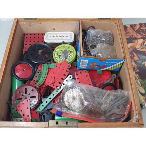 568 - A wooden box of Meccano Accessories and Instruction Pamphlets