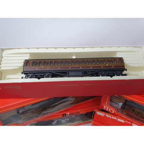 571 - A boxed Rivarossi HO 'Royal Scot' Locomotive, five boxed LMS Coaches and a boxed Fleischmann HO Turn... 