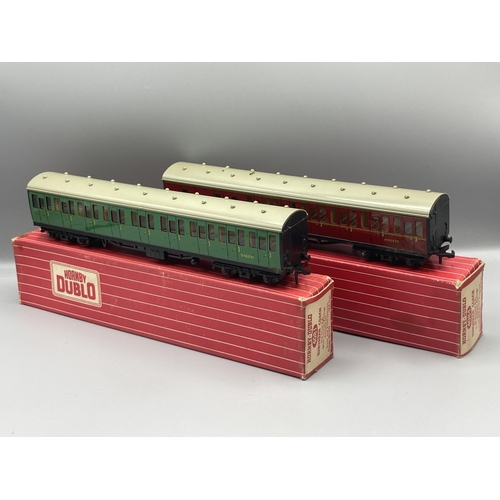 62 - Eight Hornby Dublo boxed Coaches including four super detailed suburbans, all with variable corrosio... 