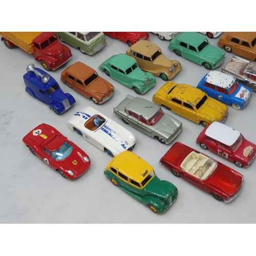 69 - Twenty two unboxed Corgi and Dinky Toys including two Hillman Minx, two Rileys, Austin Taxi, etc.