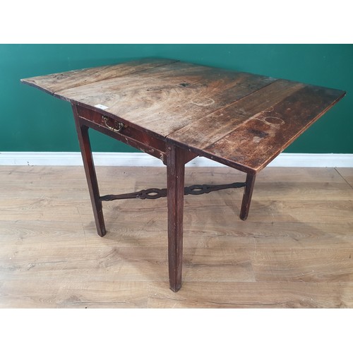 527 - An antique oak Side Table with single fitted drawer on turned supports and square stretchers and bun... 