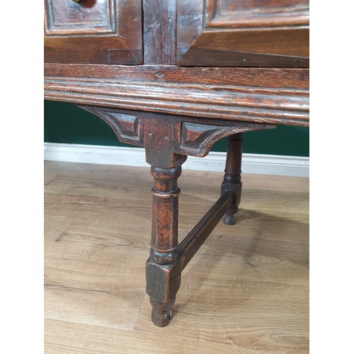 830 - A Charles II oak Dresser Base, fitted four moulded drawers on turned and squared supports and square... 